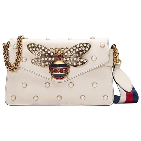 gucci broadway white leather clutch|Gucci micro gg wristlet clutch.